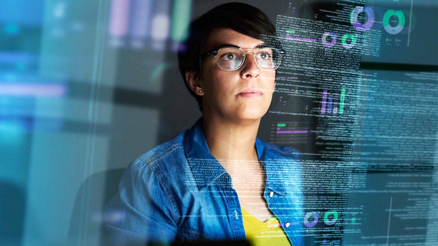 Woman working at computer viewing data on logbook software